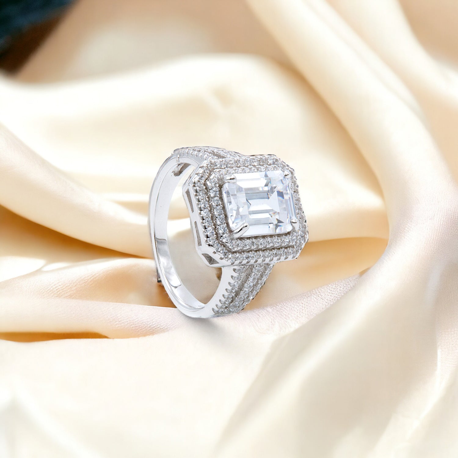 Grand Emerald-Cut Halo Ring